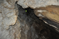 The hole where the water enters the cave